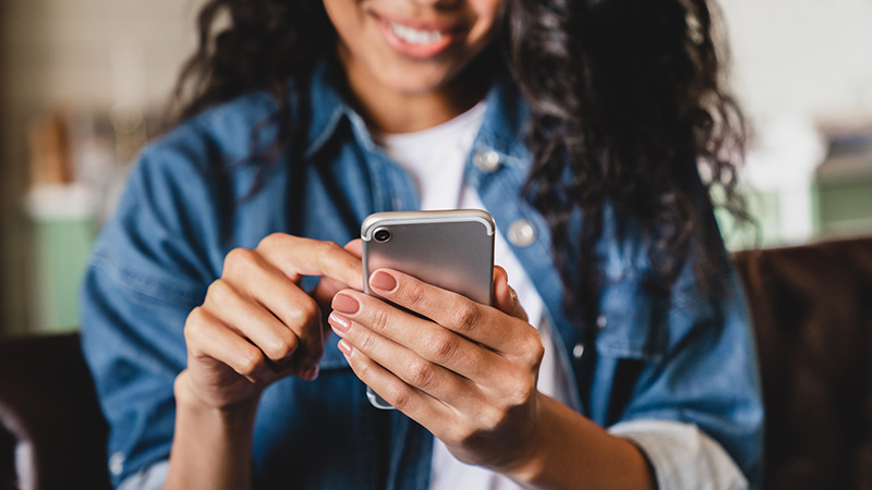 girl looking at cell phone