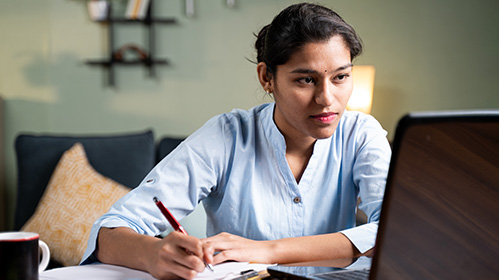 woman looking at computer