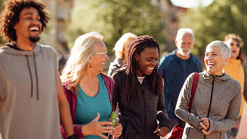 people outside walking together