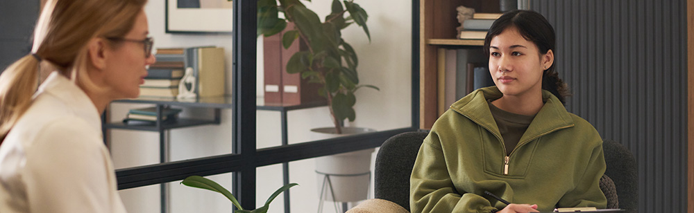 therapist talking with student