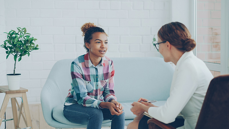 counselor taking with teen