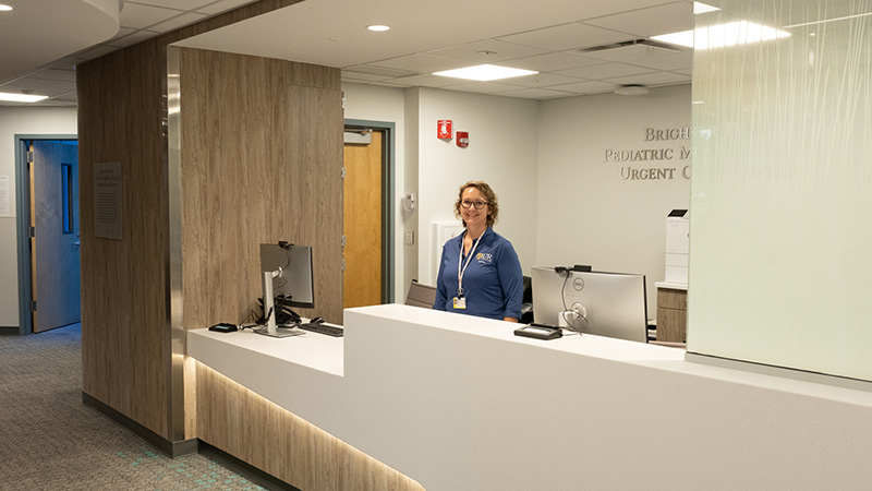 woman at medical office front desk
