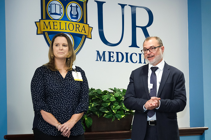 two faculty speaking in new division