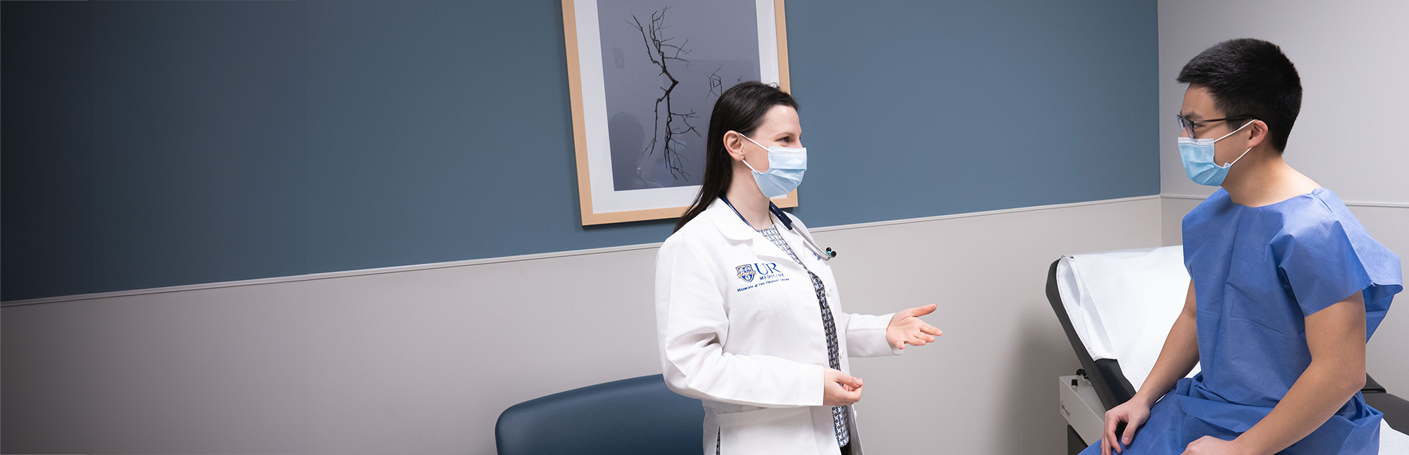 Doctor talking with patient in medical office