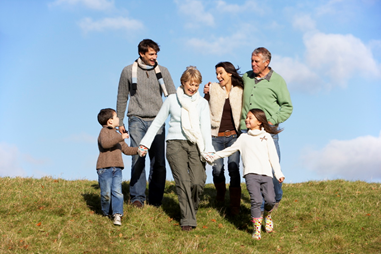 extended family walking together outside