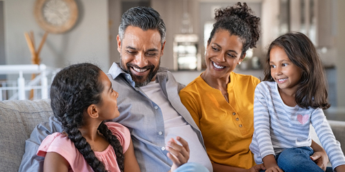 family sitting on a couch