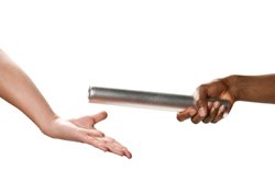 two people handing off a baton