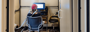 Photo of a person with EEG cap performing a task