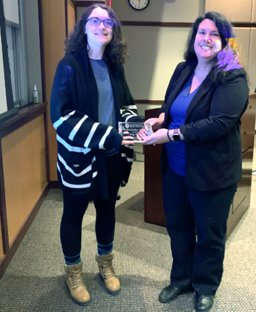 Ashley Mack receiving the Professionalism Staff Award