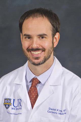 Daniel King, M.D.,