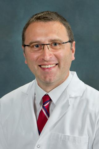 Photo of Valentin Guset, M.D., FACP, DipABLM