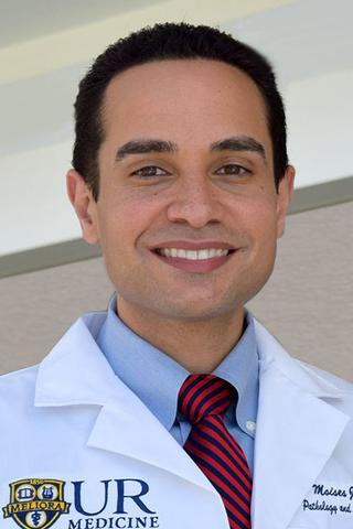 Moises J. Velez, M.D.