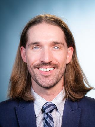 James Naughton, M.D.