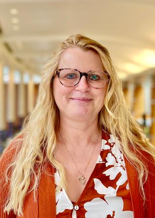 Carla J. Spooner, NP