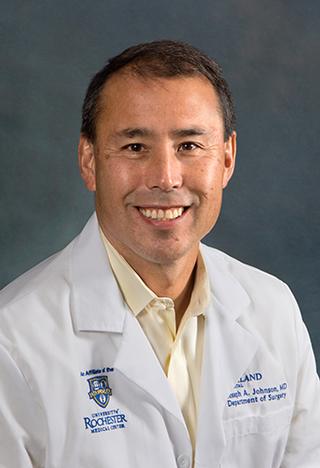 Joseph Johnson, M.D. Recognized for 20 Years as Chief of Surgery