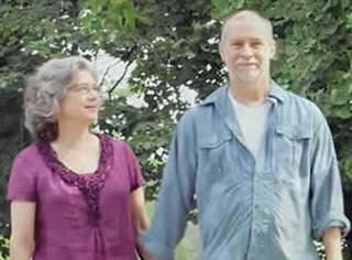 Mike Froome holding hands with his wife outdoors