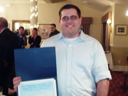 Brian Palmer with Award