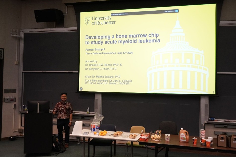 Dr. Sharipol defending her thesis