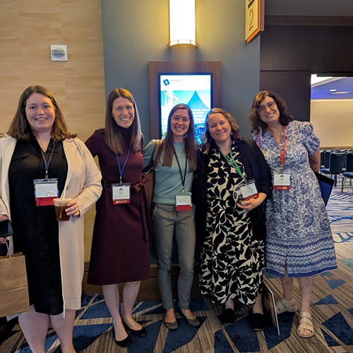 Melissa Heatly and group with award
