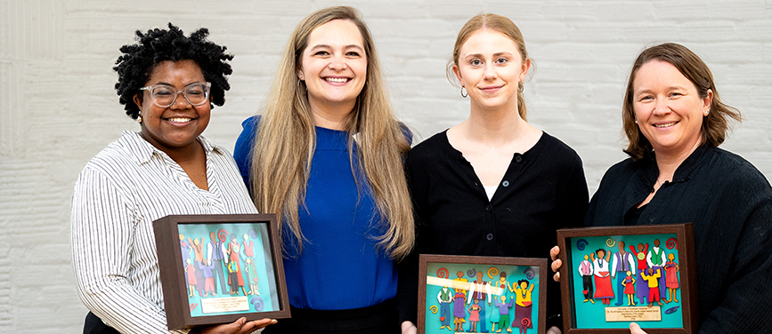 Melissa Heatly and group receiving awards