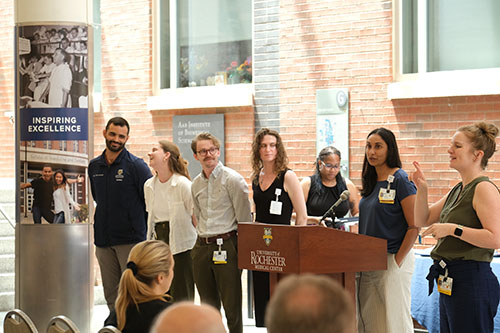 Photo of Psychology training program graduates standing on stage