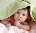 Infant under blankets