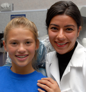 Orthodontist with patient